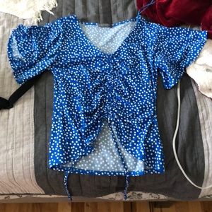 blouse with polka dots on it never worn.